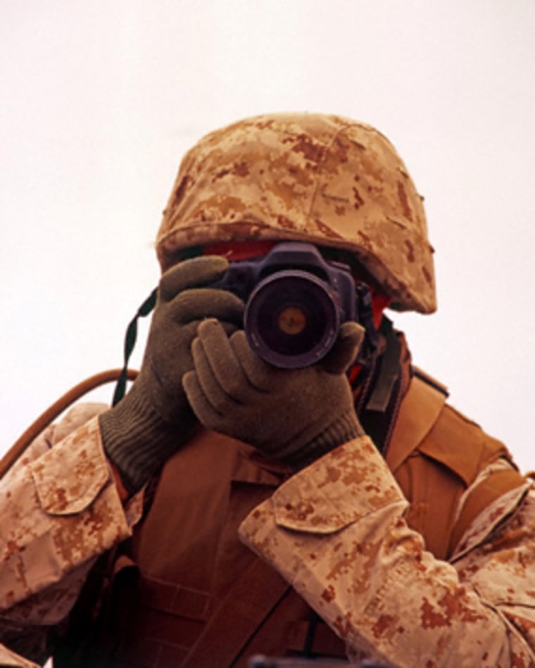 A US Marine Corps Combat Cameraman